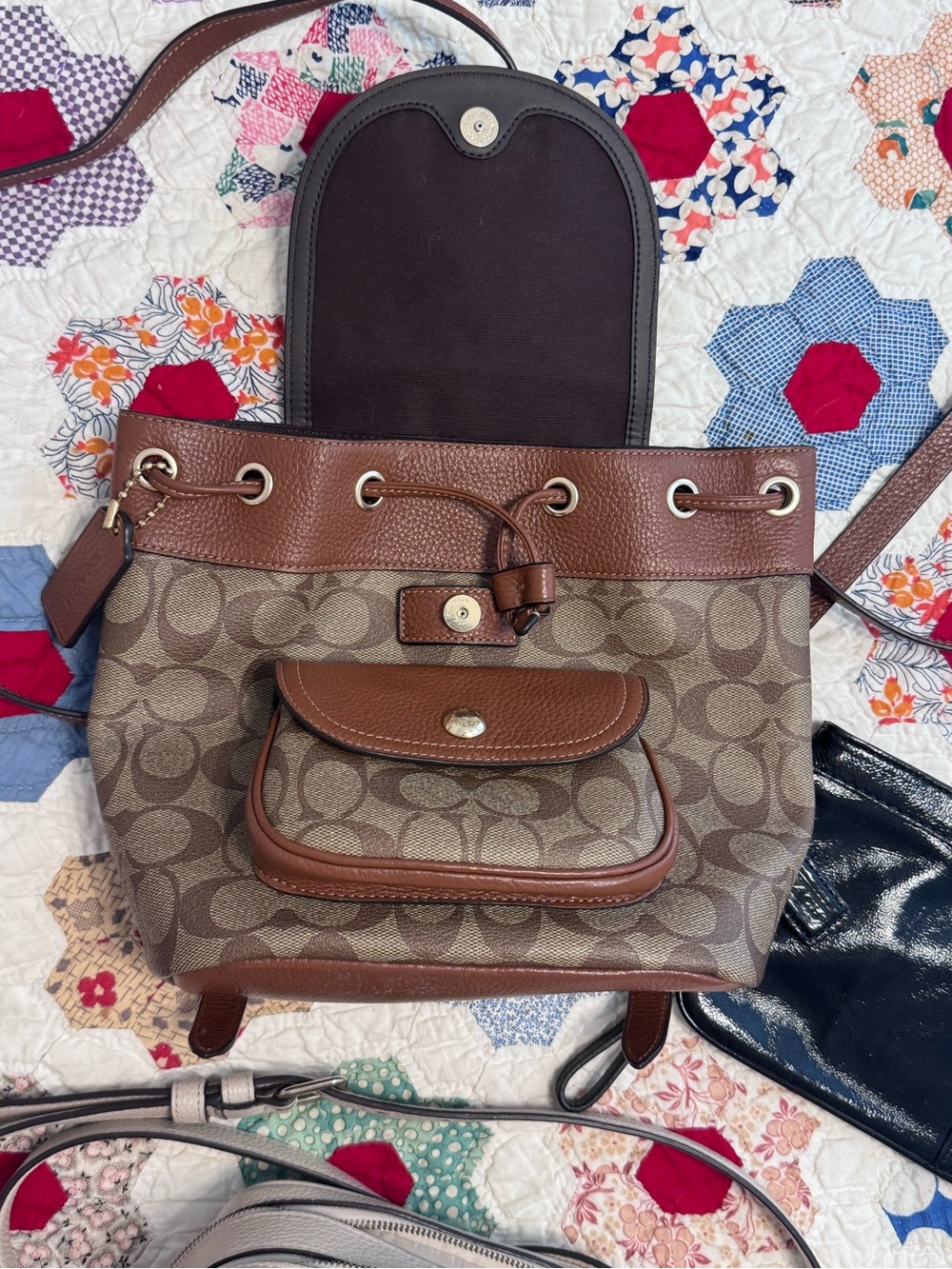 Coach Brown Signature Canvas Drawstring Crossbody Bag